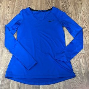 Blue long sleeve Vneck Nike Pro athletic shirt